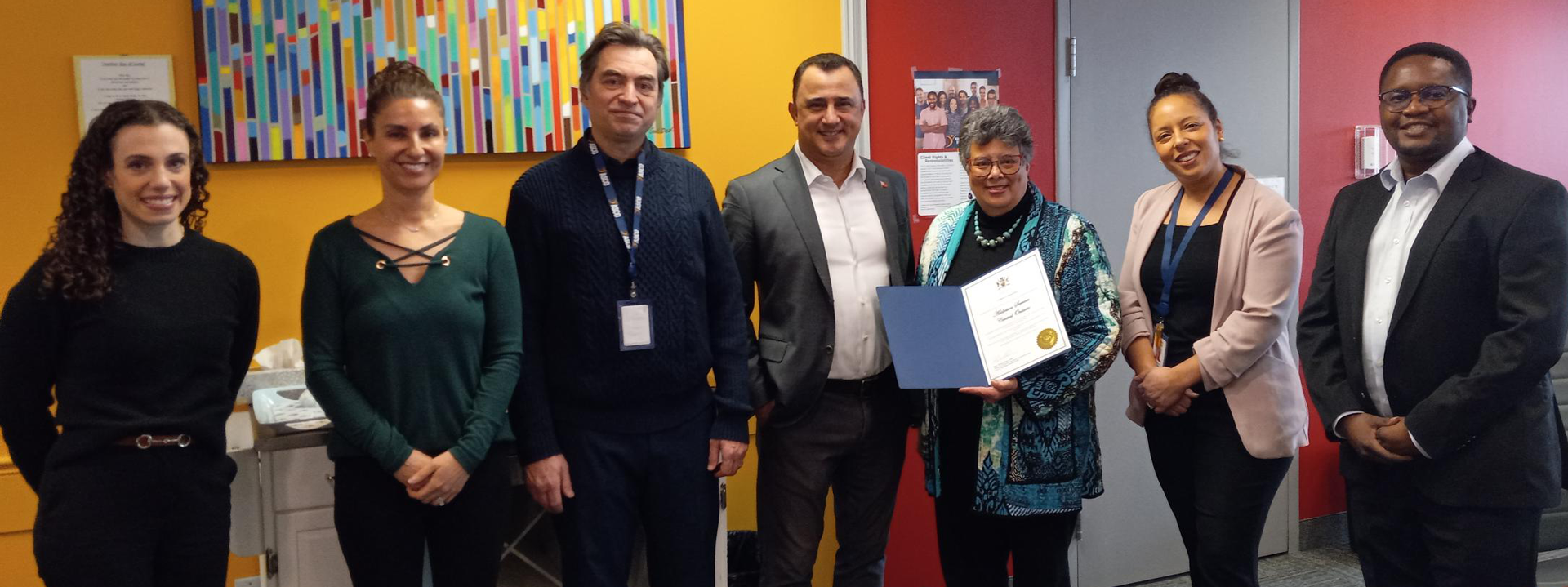 group of ASCO employees with , the Honourable Michael Parsa, Minister of Children, Community and Social Services, and MPP for Aurora—Oak Ridges—Richmond Hill